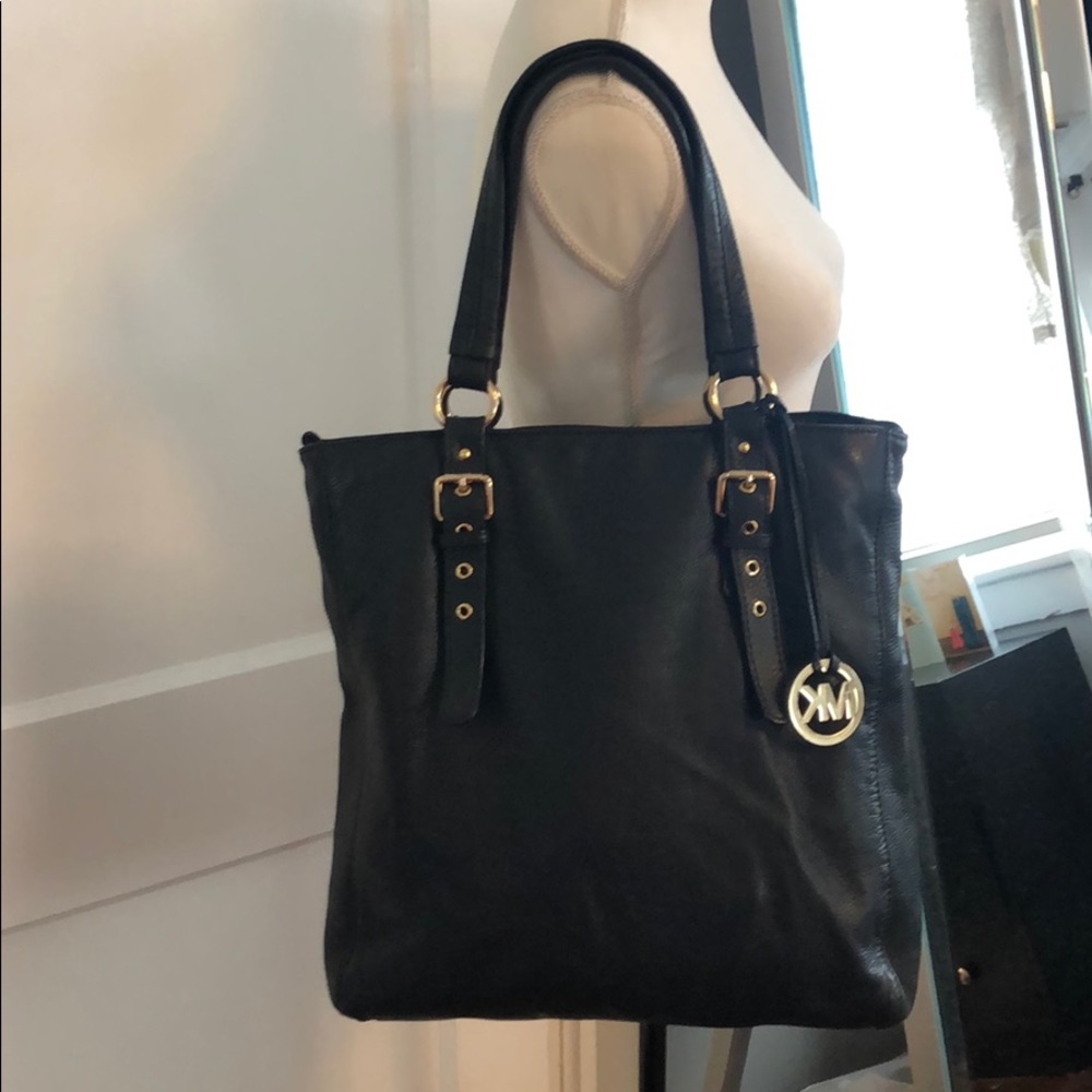 👜